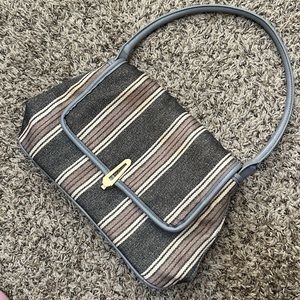 used fabric flap handbag